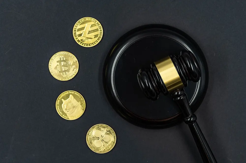paris sportif en ligne crypto - cryptocurrency coins on a table